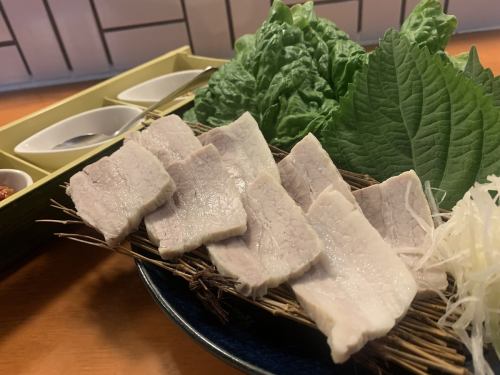 Bossam - Steamed pork - (kimchi, lettuce, perilla leaves, green onion seasoning, miso, mustard)