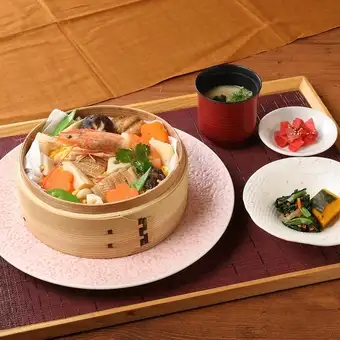 Steamed rice with shrimp and colorful mixed vegetables