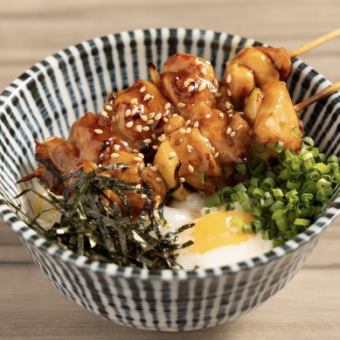 Charcoal grilled yakitori rice bowl topped with a soft-boiled egg