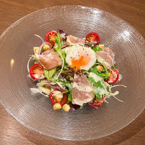Prosciutto and soft-boiled egg salad
