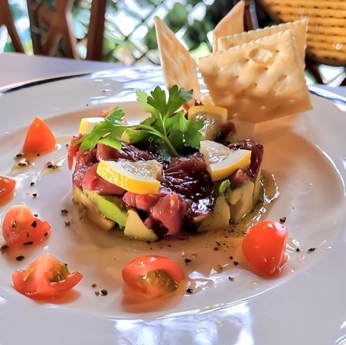 Horse meat and avocado tartare with truffle soy sauce