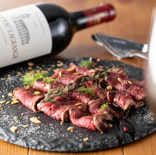 Thinly sliced flaxseed beef tagliata