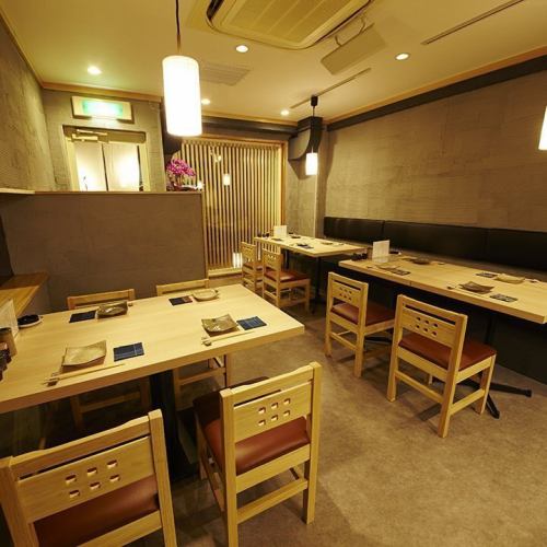 [Table seats] The warm interior of the restaurant is a cozy, adult space.