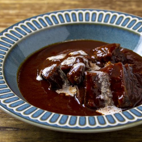 Beef stewed in rich red wine