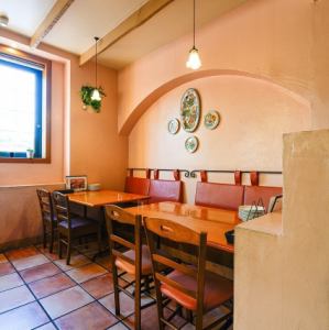 On the first floor, there is space for one stroller and two tables with seats for four, which can accommodate up to eight people side by side.