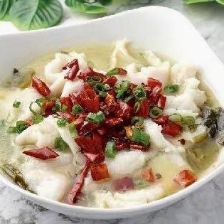 White fish simmered in Sichuan-style pickled mustard greens