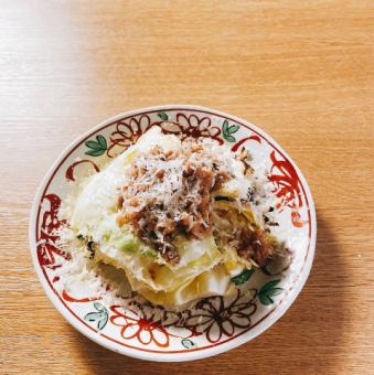 Grilled spring cabbage topped with minced duck breast
