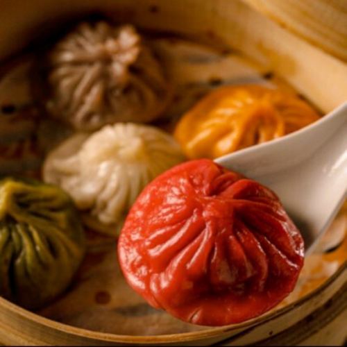 The colorful "Five-Color Xiaolongbao" is a popular menu item at our restaurant.