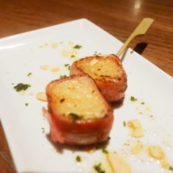 Seaweed, salted potatoes, butter and bacon wrapped