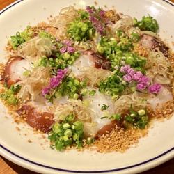 Octopus carpaccio with special sesame oil