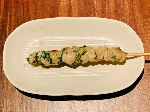 紫蘇葉包裹的雞脖子