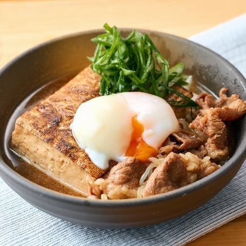 Sukiyaki-style meat and tofu stew with a soft-boiled egg on top