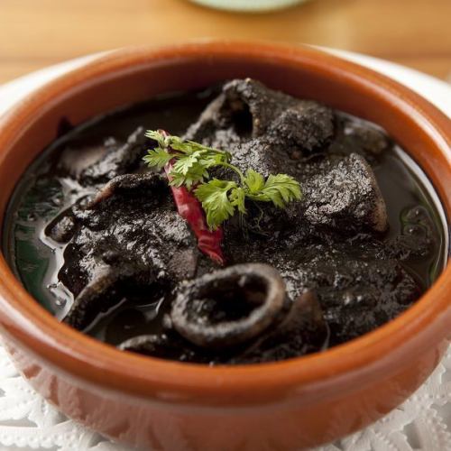 Spicy squid ink stew