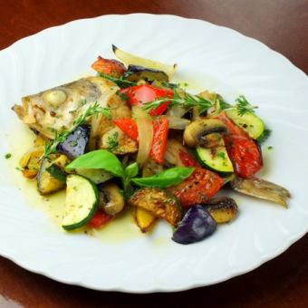 Grilled rockfish vegetables with herbs in the oven