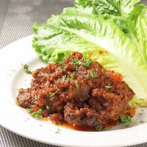 Beef tendon stewed in tomato sauce