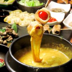 Vegetable roll skewers Curry cheese fondue