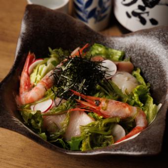 Seafood salad with seaweed and seasoning