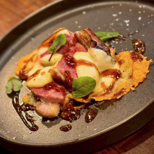 Grilled Omi duck breast with grilled mozzarella cheese.