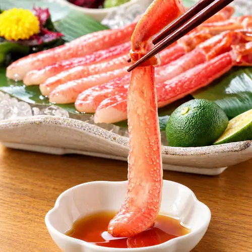 Raw snow crab sashimi