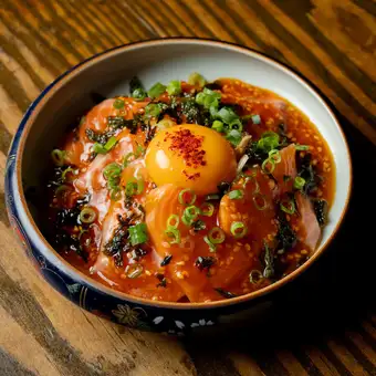Fatty salmon and egg yolk yukhoe