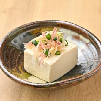 Cold tofu covered in condiments