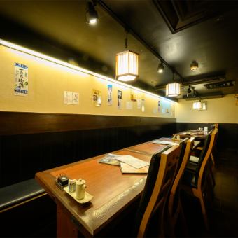 Table seating for up to 22 people.This seating can also be divided by a noren curtain to accommodate 10, 8, or 4 people.