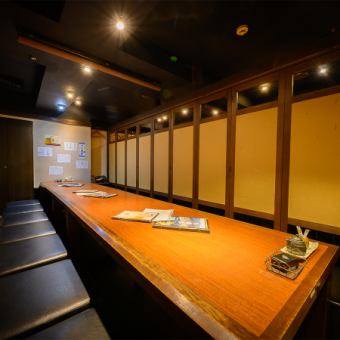 A private room with a sunken kotatsu table for 15 people