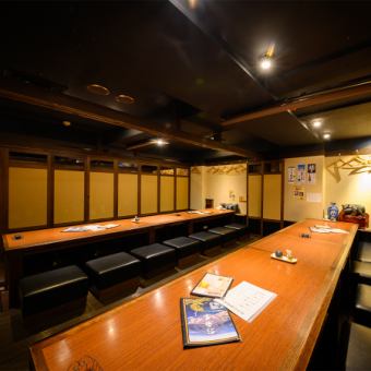 A private room with a sunken kotatsu table for 30 people