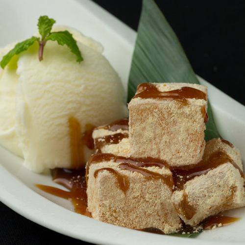 Kinako warabi mochi with milk ice cream and brown sugar syrup