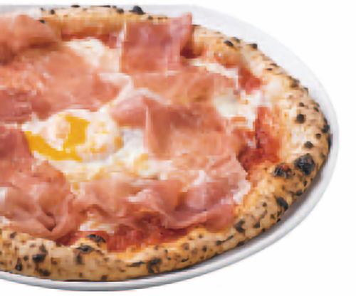Pizza with raw ham and soft-boiled egg