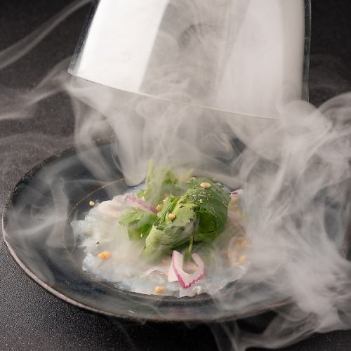 Enjoy neo-Thai cuisine with all five senses. Our signature dish is made with fresh fish delivered directly from the market and flash smoked right before your eyes!