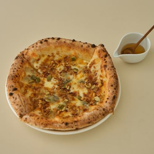 Honey pizza with four kinds of cheese and nuts
