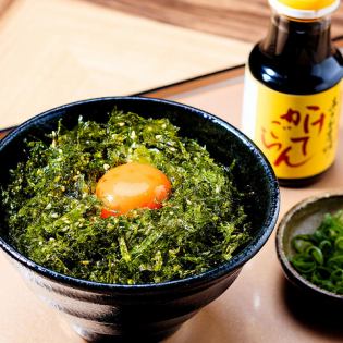 Raw egg on rice with seaweed