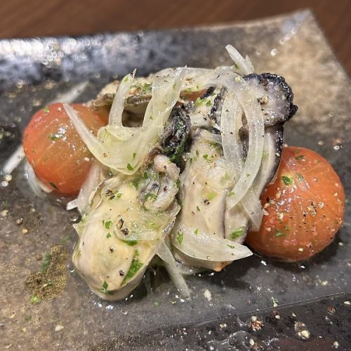 Oysters and tomatoes in lemon basil marinade