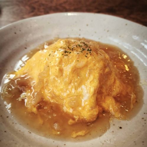 蟹肉烩饭配鱼翅酱