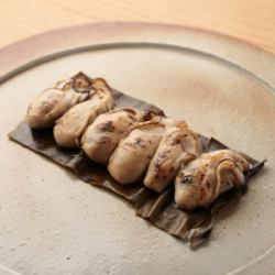 Grilled oysters with kelp