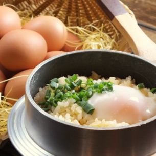 Earthenware pot rice with egg