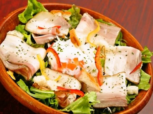 Homemade bacon Caesar salad topped with Kirishima E egg and egg