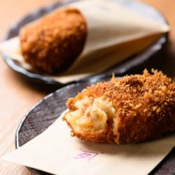 Potato croquette with dashi stock