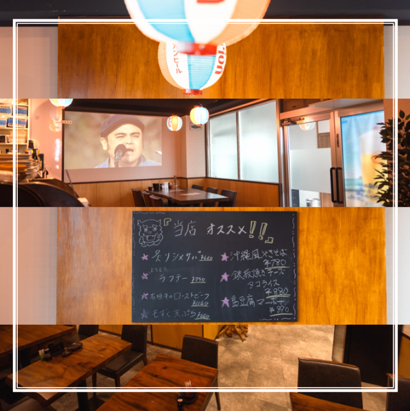 【賑やかで親しみやすい沖縄らしい雰囲気】石垣島の伝統を感じる装飾が施された店内では、店員さんの明るい笑顔や元気な声が響き、どこか懐かしさと温かさを感じます。木のテーブルや椅子に囲まれた空間で、グループや大勢での食事に最適です。