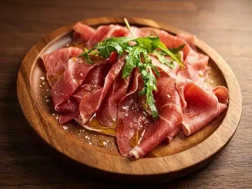 Freshly sliced French prosciutto