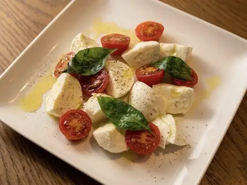Luxurious Caprese salad with Italian buffalo mozzarella