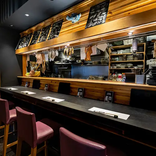 Spacious table seating and a lively counter.