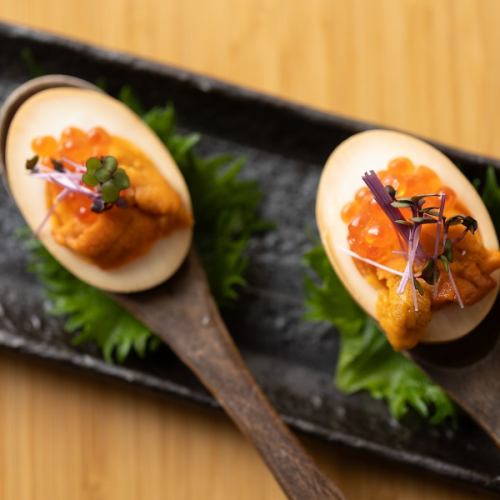 Soft-boiled egg with raw sea urchin and salmon roe