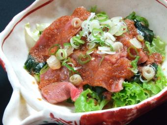 Marbled Wagyu beef grilled shabu-shabu and wakame seaweed salad