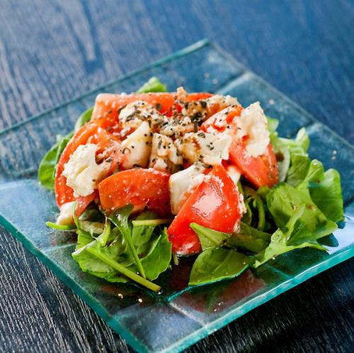 Caprese with three kinds of cheese and whole tomatoes