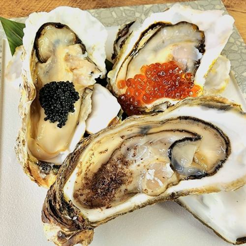 Three luxurious items (truffle, salmon roe, caviar)