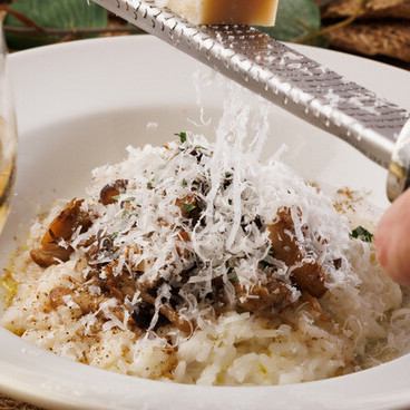 Risotto with porcini mushrooms and three kinds of cheese