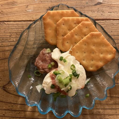 Snacks with sake thief, cream cheese, and lots of green onions