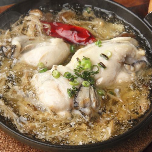 Oyster and mushroom ajillo served with baguette